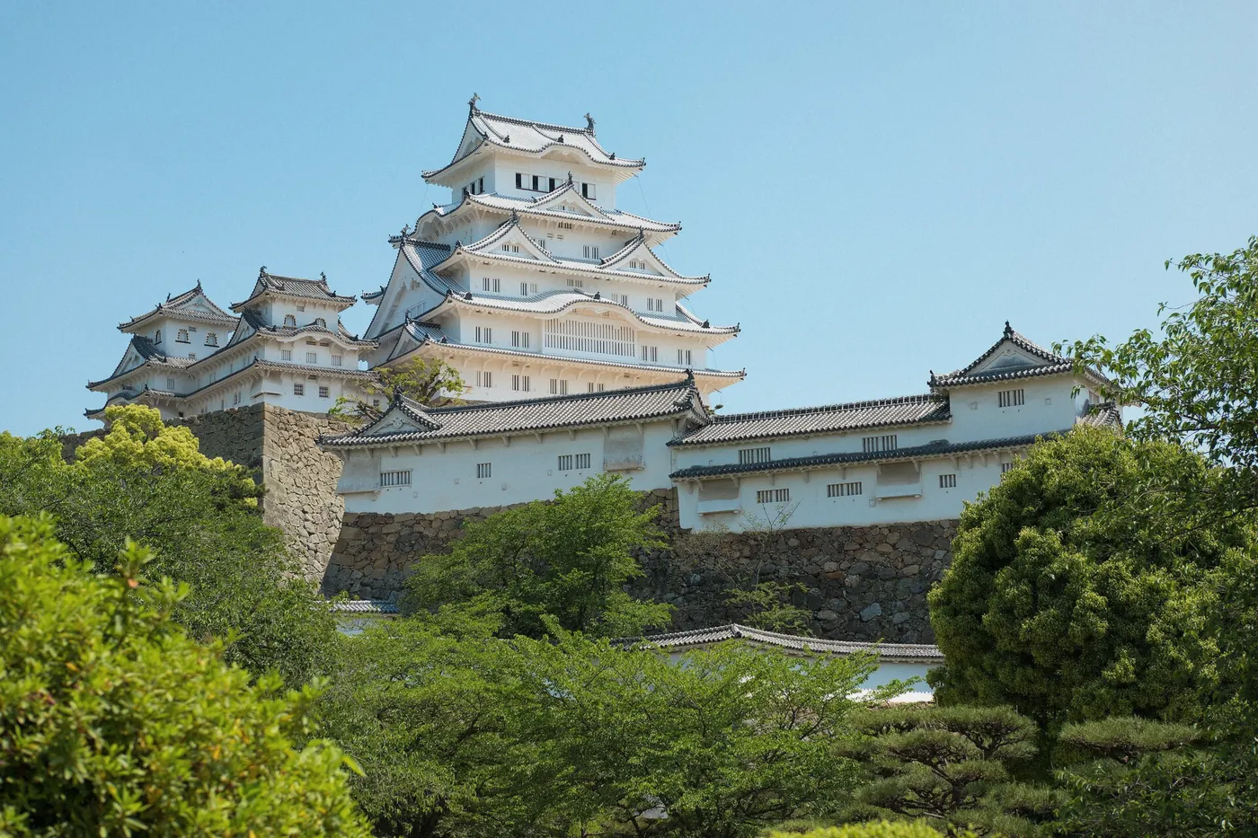 White keep of Himeji Castle against a clear sky, Himeji, Japan
