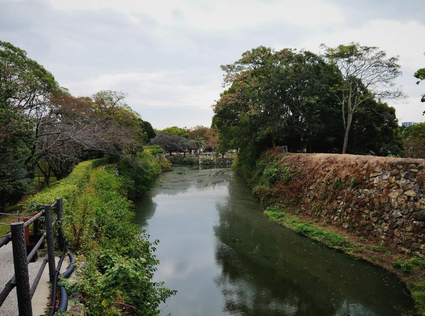 Third view across the moat toward the gates of Himeji Castle, Japan