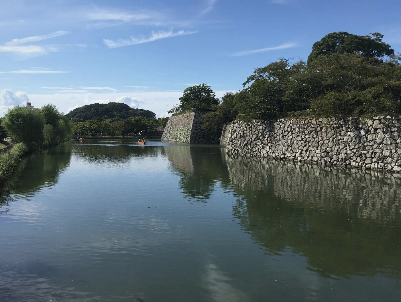 Moat and white walls of Himeji Castle on the licensed-guide route, Himeji, Japan