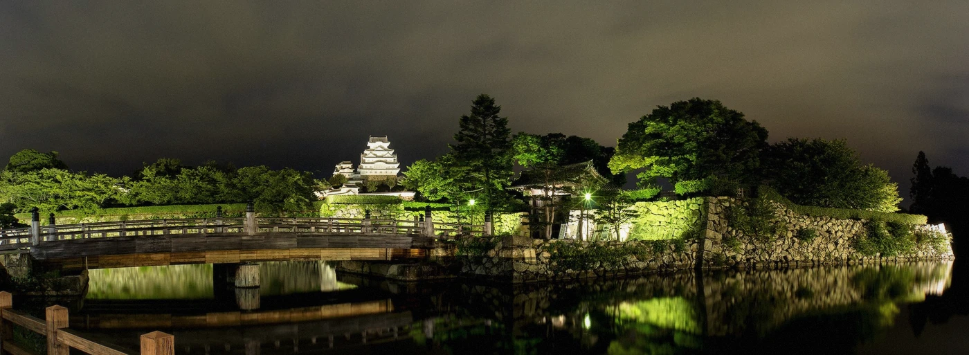 Illuminated keep of Himeji Castle at dusk, Himeji, Japan