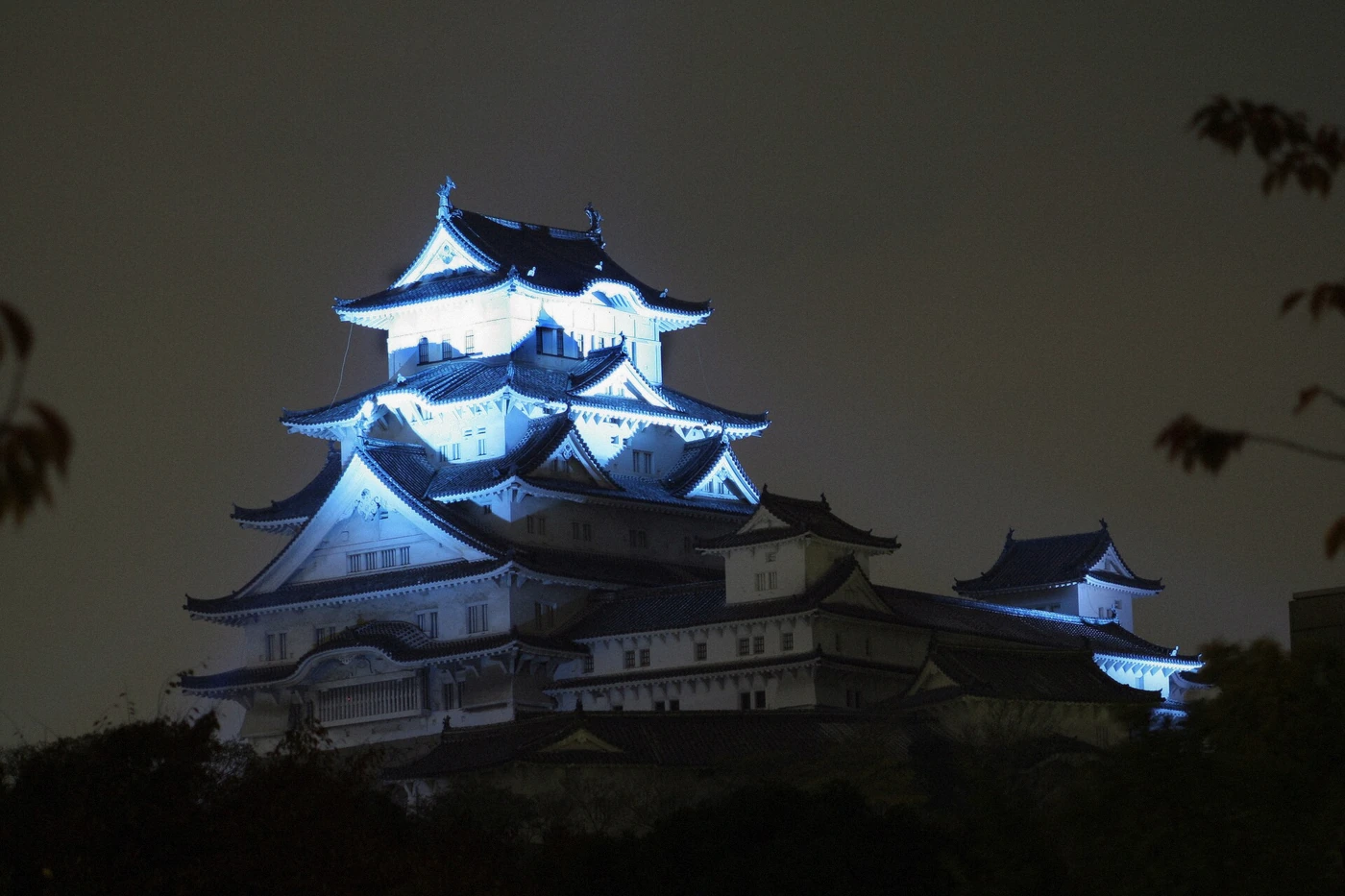 Blue-lit keep of Himeji Castle after closing hours, Himeji, Japan