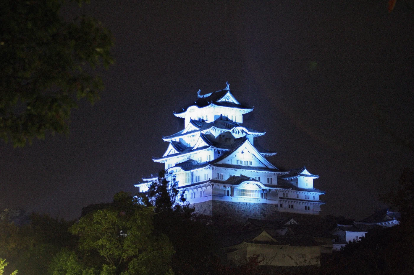 White keep of Himeji Castle above the baileys on the samurai castle tour route, Himeji, Japan